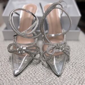 Never been worn women’s sz 8 (fits like a 7) ARQA transparent bow slingbacks.